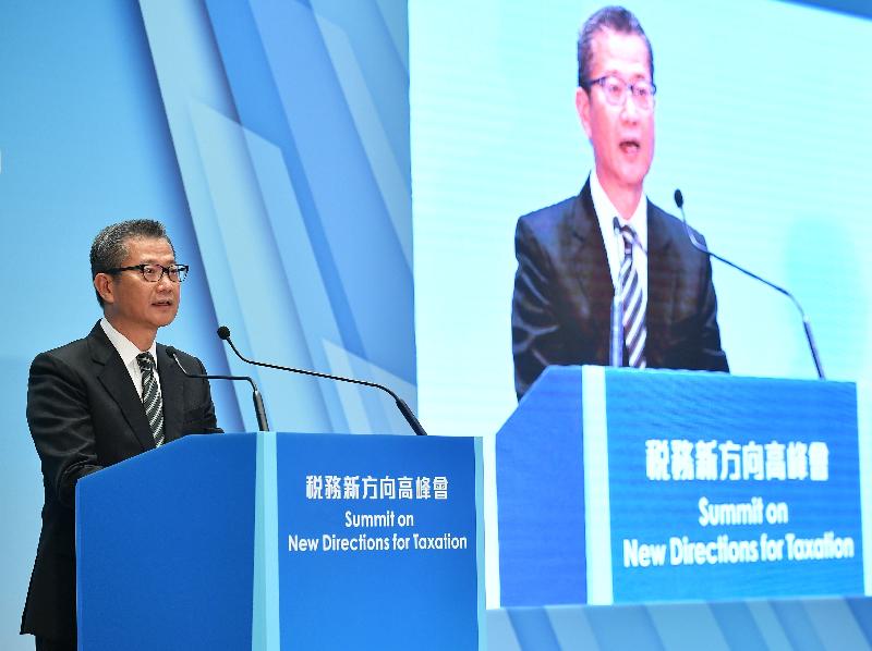 The Financial Secretary, Mr Paul Chan, delivers a keynote speech at the Summit on New Directions for Taxation held at the Central Government Offices this afternoon (October 23).