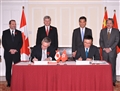 Hong Kong entered into an agreement with Canada today (November 11) for the avoidance of double taxation and the prevention of fiscal evasion with respect to taxes on income. Photo shows the Chief Executive, Mr C Y Leung (back row, second right), and the Prime Minister of Canada, Mr Stephen Harper (back row, second left), witnessing the signing of the agreement by the Secretary for Financial Services and the Treasury, Professor K C Chan (front row, right), and the Canadian Minister of International Trade and Minister for the Asia-Pacific Gateway, Mr Edward Fast (front row, left). 