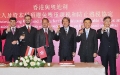 Mr Tsang (third right); Professor Chan (second right); Commissioner of Inland Revenue, Mr Chu Yam-yuen (right); Mr Schieder (third left) and other guests propose a toast after signing the agreement.