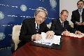 The Financial Secretary, Mr John C Tsang (first left) and Romania's State Secretary for Public Finance, Mr Attila György (second left), sign an agreement on the avoidance of double taxation in Bucharest today (November 18)